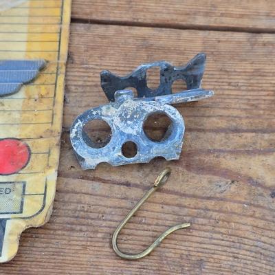 Antique porcelain insulators - cast iron - wrenches - and other rustic farm items for the side of the farm shed!