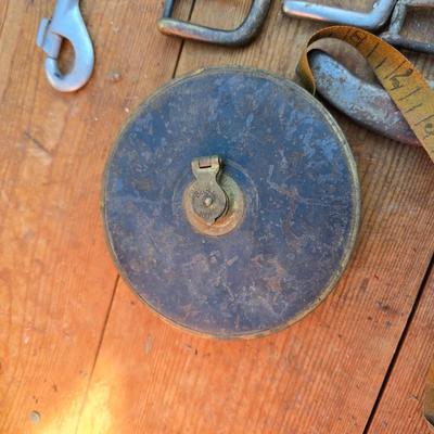 Antique porcelain insulators - cast iron - wrenches - and other rustic farm items for the side of the farm shed!