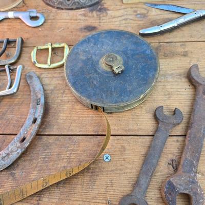 Antique porcelain insulators - cast iron - wrenches - and other rustic farm items for the side of the farm shed!
