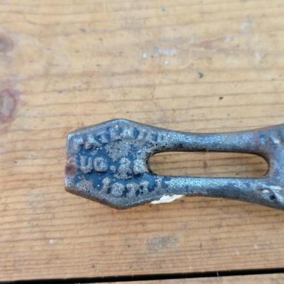 Antique porcelain insulators - cast iron - wrenches - and other rustic farm items for the side of the farm shed!