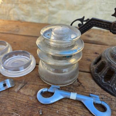 Antique porcelain insulators - cast iron - wrenches - and other rustic farm items for the side of the farm shed!
