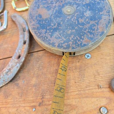 Antique porcelain insulators - cast iron - wrenches - and other rustic farm items for the side of the farm shed!