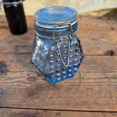 Collection of glassware - MCM Forester Marigold carnival glass decanter - Coplin style glass staining jar - assortment of other jars and...