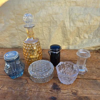Collection of glassware - MCM Forester Marigold carnival glass decanter - Coplin style glass staining jar - assortment of other jars and...