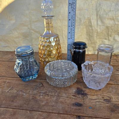 Collection of glassware - MCM Forester Marigold carnival glass decanter - Coplin style glass staining jar - assortment of other jars and...