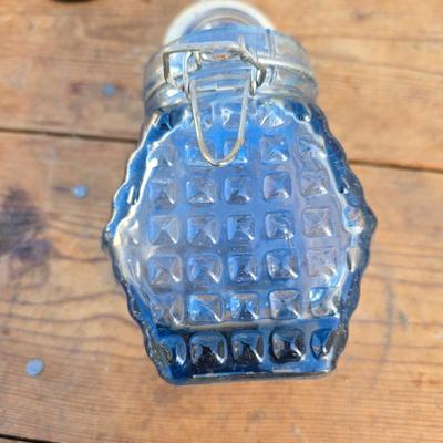 Collection of glassware - MCM Forester Marigold carnival glass decanter - Coplin style glass staining jar - assortment of other jars and...