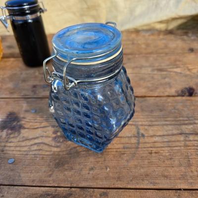 Collection of glassware - MCM Forester Marigold carnival glass decanter - Coplin style glass staining jar - assortment of other jars and...