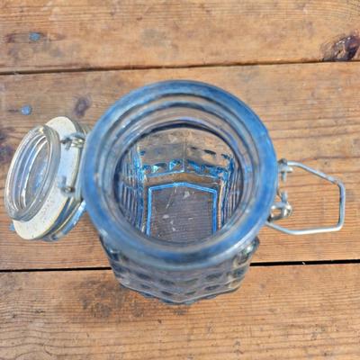 Collection of glassware - MCM Forester Marigold carnival glass decanter - Coplin style glass staining jar - assortment of other jars and...