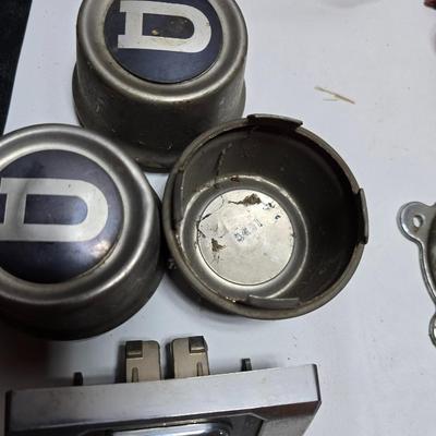 Lots of vintage car parts - trim - shifters - radio - and more