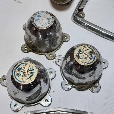 Lots of vintage car parts - trim - shifters - radio - and more