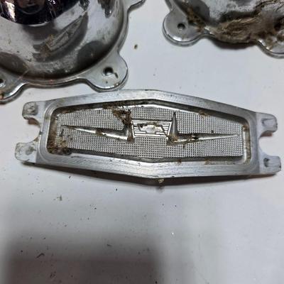Lots of vintage car parts - trim - shifters - radio - and more
