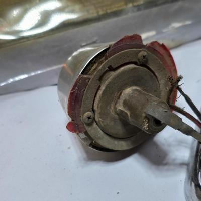 Lots of vintage car parts - trim - shifters - radio - and more