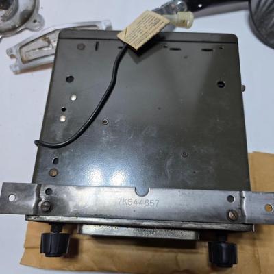 Lots of vintage car parts - trim - shifters - radio - and more