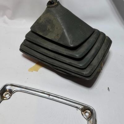Lots of vintage car parts - trim - shifters - radio - and more