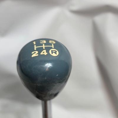 Lots of vintage car parts - trim - shifters - radio - and more