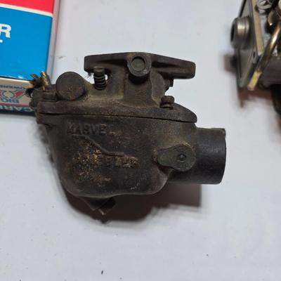Antique Wisconsin gas carburetor - larger carburetor - and many carburetor tune up kits