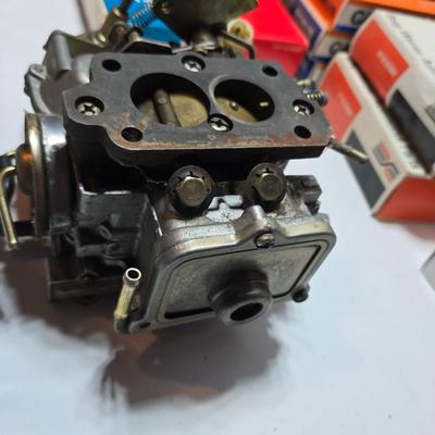 Antique Wisconsin gas carburetor - larger carburetor - and many carburetor tune up kits