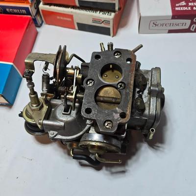 Antique Wisconsin gas carburetor - larger carburetor - and many carburetor tune up kits