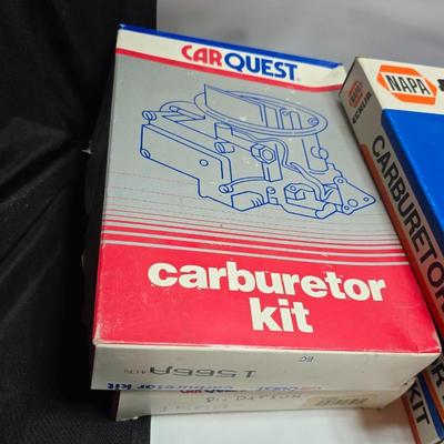 Antique Wisconsin gas carburetor - larger carburetor - and many carburetor tune up kits