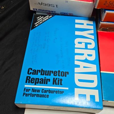 Antique Wisconsin gas carburetor - larger carburetor - and many carburetor tune up kits