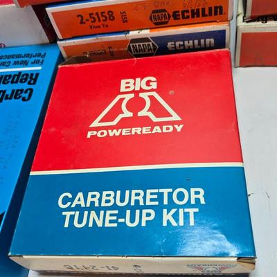 Antique Wisconsin gas carburetor - larger carburetor - and many carburetor tune up kits