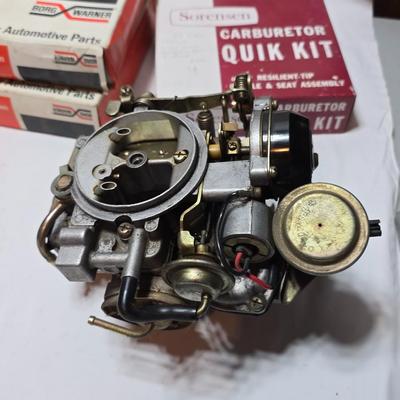 Antique Wisconsin gas carburetor - larger carburetor - and many carburetor tune up kits