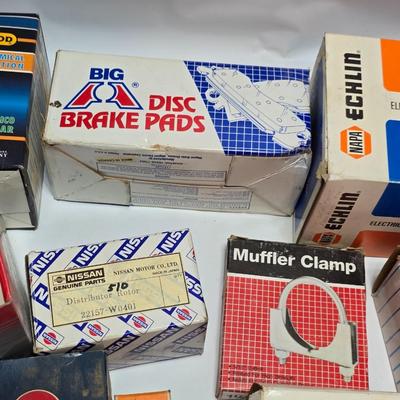 Large variety of auto parts in packaging - Datsun - Ford and more