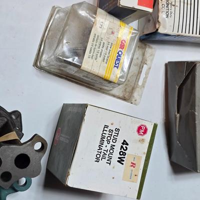 Large variety of auto parts in packaging - Datsun - Ford and more