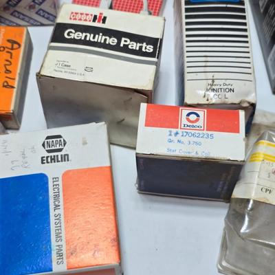 Large variety of auto parts in packaging - Datsun - Ford and more
