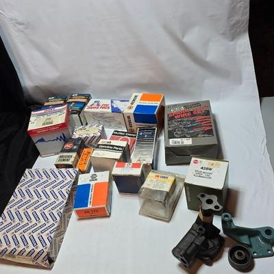 Large variety of auto parts in packaging - Datsun - Ford and more