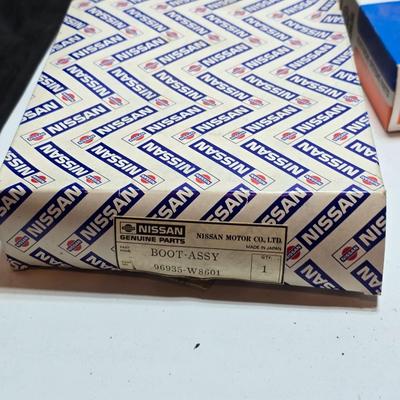 Large variety of auto parts in packaging - Datsun - Ford and more