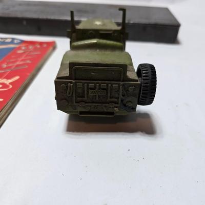 Vintage Plomb tools catalog with military jeep cologn bottle and two vintage snap on metal organizing boxes -
