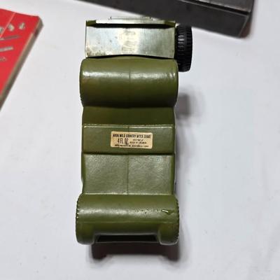 Vintage Plomb tools catalog with military jeep cologn bottle and two vintage snap on metal organizing boxes -