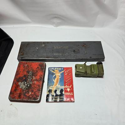 Vintage Plomb tools catalog with military jeep cologn bottle and two vintage snap on metal organizing boxes -