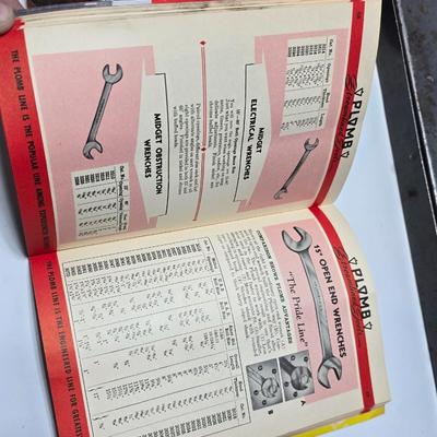 Vintage Plomb tools catalog with military jeep cologn bottle and two vintage snap on metal organizing boxes -