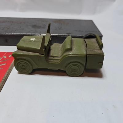 Vintage Plomb tools catalog with military jeep cologn bottle and two vintage snap on metal organizing boxes -