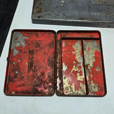 Vintage Plomb tools catalog with military jeep cologn bottle and two vintage snap on metal organizing boxes -