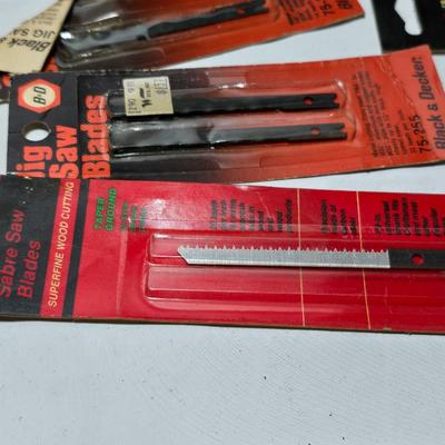 Craftsman 1/2-inch Sabre saw - Master super ball casters - and an assortment of other hardware