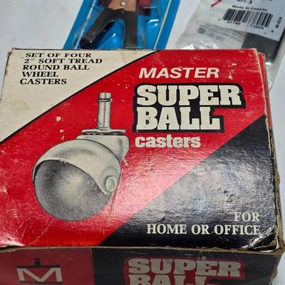 Craftsman 1/2-inch Sabre saw - Master super ball casters - and an assortment of other hardware
