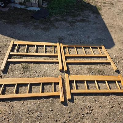 Two matching twin - sized wooden headboard & footboards