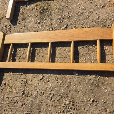 Two matching twin - sized wooden headboard & footboards