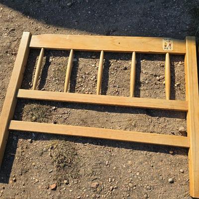 Two matching twin - sized wooden headboard & footboards