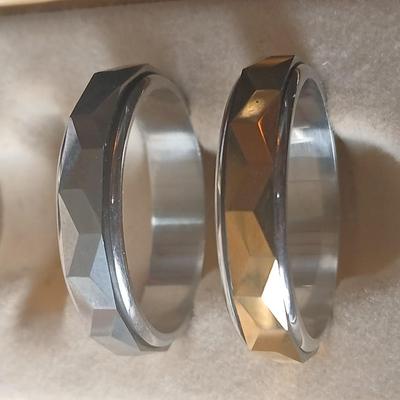 Two men's fidget rings - Leather tooled wallet - watch - and a bow tie
