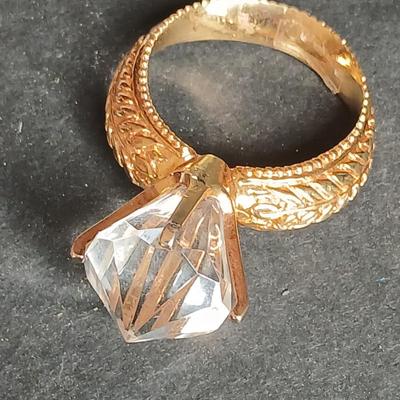 Two womens watches with faux diamonds and a Big huge faux diamond ring