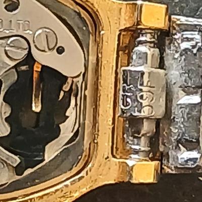 Two womens watches with faux diamonds and a Big huge faux diamond ring