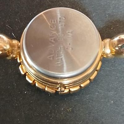 Two womens watches with faux diamonds and a Big huge faux diamond ring