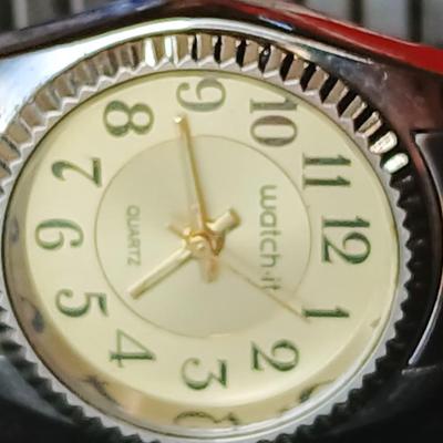 Two gold toned thick chain necklaces with a Watch - it watch