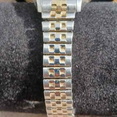 Two gold toned thick chain necklaces with a Watch - it watch