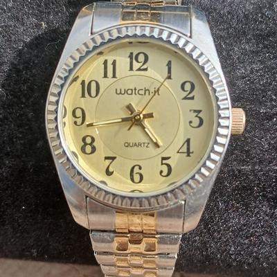 Two gold toned thick chain necklaces with a Watch - it watch
