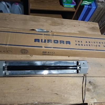 Vintage Aurora projection screen with an electric black light